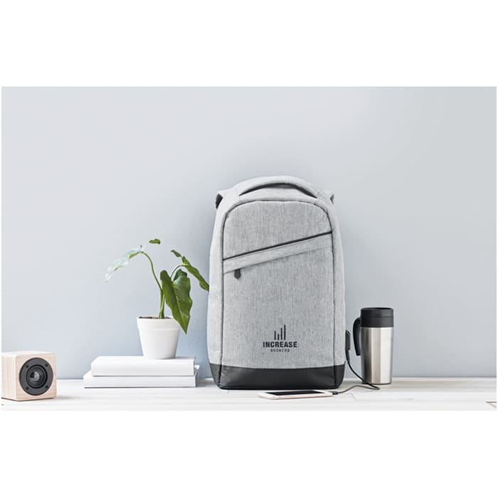MP2533070-mochila-antirrobo-jaspeada-gris-2.jpg